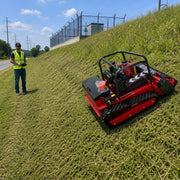 GreenShine GST-1000 remote-controlled tracked flail mower with operator at safe distance