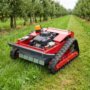 GreenShine GST-550 hybrid tracked mower working in an orchard lawn